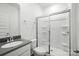 Bathroom featuring a toilet, single vanity and a glass-enclosed shower stall at 330 Knotty Wood Dr # 67, Monroe, NC 28110