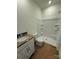 Well-lit bathroom with a shower, modern sink, and sleek fixtures at 330 Knotty Wood Dr # 67, Monroe, NC 28110