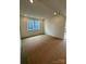 Spacious bedroom with a large window, neutral walls, and plush carpeting at 330 Knotty Wood Dr # 67, Monroe, NC 28110