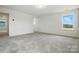 Bedroom featuring neutral carpet and a large window at 330 Knotty Wood Dr # 67, Monroe, NC 28110