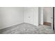 Bedroom with neutral carpet, double closet and entry door at 330 Knotty Wood Dr # 67, Monroe, NC 28110