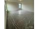 A bright bedroom with neutral walls and carpet, featuring a window that provides natural light to the room at 330 Knotty Wood Dr # 67, Monroe, NC 28110