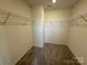 This walk-in closet is equipped with wire shelving for optimal organization at 330 Knotty Wood Dr # 67, Monroe, NC 28110