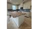 Modern kitchen featuring white cabinets, stainless steel appliances, and a large island with countertop at 330 Knotty Wood Dr # 67, Monroe, NC 28110