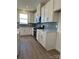 Modern kitchen showcasing white cabinets, stainless steel appliances, and stylish backsplash at 330 Knotty Wood Dr # 67, Monroe, NC 28110