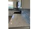 Kitchen counter with elegant granite countertops and stainless steel gas range at 330 Knotty Wood Dr # 67, Monroe, NC 28110