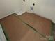 A laundry room with washer and dryer hookups and unfinished flooring at 330 Knotty Wood Dr # 67, Monroe, NC 28110
