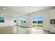 Bright living room with wood floors, recessed lighting and large sliding glass doors to backyard at 330 Knotty Wood Dr # 67, Monroe, NC 28110