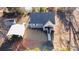 Aerial view of the home showcasing its well-maintained exterior and ample parking at 445 Cannon Farm Rd, China Grove, NC 28023