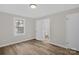 Bedroom with new floors, fresh paint, and natural light from the window at 445 Cannon Farm Rd, China Grove, NC 28023