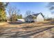 Exterior view of the home showcasing the front porch, white railings, and well-maintained landscaping at 445 Cannon Farm Rd, China Grove, NC 28023