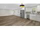 Open concept kitchen with stainless steel appliances and new hardwood floors at 445 Cannon Farm Rd, China Grove, NC 28023