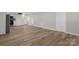 Spacious living room showcasing new floors and access to the kitchen at 445 Cannon Farm Rd, China Grove, NC 28023