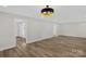 Spacious living room with new floors and updated lighting fixture at 445 Cannon Farm Rd, China Grove, NC 28023