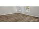 Bright living room with newly installed floors and fresh paint at 445 Cannon Farm Rd, China Grove, NC 28023