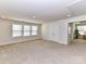 Spacious bonus room with carpet flooring, neutral walls, and natural light from multiple windows at 4505 Plicata Dr, Indian Land, SC 29707