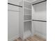 Walk-in closet with shelving and hanging rods at 4531 Rockford Ct, Charlotte, NC 28209