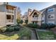 Condo complex exterior showcasing well-manicured greenery and architectural details at 5009 Sharon Rd # E, Charlotte, NC 28210