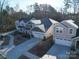 Aerial view of several two-story homes with paved driveways in a desirable residential neighborhood at 5028 Colline Ct, Charlotte, NC 28216