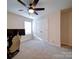 Bright bedroom featuring neutral walls and double door closet at 5028 Colline Ct, Charlotte, NC 28216