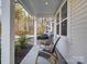 Charming front porch with comfortable seating and natural light at 5028 Colline Ct, Charlotte, NC 28216