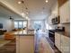 Spacious open concept kitchen with stainless appliances, granite countertops, and breakfast nook at 5028 Colline Ct, Charlotte, NC 28216