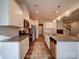 Well-lit kitchen with granite countertops, stainless steel appliances, and ample cabinet space at 5028 Colline Ct, Charlotte, NC 28216