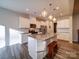 Bright kitchen featuring granite countertops, stainless steel appliances and a large island at 5028 Colline Ct, Charlotte, NC 28216