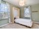 This bedroom features a unique built-in bed and large windows at 6503 Revolutionary Trl, Charlotte, NC 28217