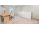 Versatile loft area with a built-in desk, perfect for a home office or study space at 6503 Revolutionary Trl, Charlotte, NC 28217