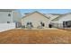 Backyard featuring a patio area, modern outdoor furniture, and grill at 6509 Gopher Rd, Lancaster, SC 29720