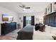 Primary bedroom features a ceiling fan, television, and a large window providing lots of natural light at 6509 Gopher Rd, Lancaster, SC 29720