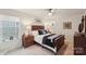 Comfortable bedroom features a large bed, matching nightstands, and soft, neutral decor at 6509 Gopher Rd, Lancaster, SC 29720
