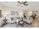 Inviting living room featuring neutral colors, stylish furniture, and views into the adjacent kitchen at 6509 Gopher Rd, Lancaster, SC 29720