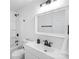 Bathroom with new vanity, tub with shower and classic fixtures and mirror at 717 Perth Rd, Troutman, NC 28166