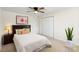 Cozy bedroom featuring a ceiling fan, a comfortable bed, and a spacious double-door closet at 717 Perth Rd, Troutman, NC 28166