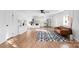 An open-concept living room with a modern interior that connects to the kitchen area at 717 Perth Rd, Troutman, NC 28166