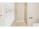 Well lit bathroom with a glass enclosed shower, tile floors, and a large window at 775 Summerwood Dr, Rock Hill, SC 29732
