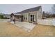 A spacious patio featuring a built-in grill, pergola, with plenty of space for relaxation and entertainment at 105 Blossom Ridge Dr, Mooresville, NC 28117