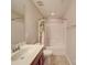 Clean bathroom featuring a vanity with sink, toilet, and shower at 105 Blossom Ridge Dr, Mooresville, NC 28117
