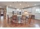 Modern kitchen with a spacious granite island, stainless steel appliances, and ample cabinet space at 105 Blossom Ridge Dr, Mooresville, NC 28117