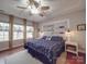 Comfortable main bedroom with natural light and nautical-themed decorations at 105 Blossom Ridge Dr, Mooresville, NC 28117