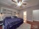 Inviting bedroom with stylish nautical accents and an ensuite bathroom at 105 Blossom Ridge Dr, Mooresville, NC 28117
