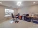 Bright office space featuring a large window, desk, and carpeted floors, great for working at home at 105 Blossom Ridge Dr, Mooresville, NC 28117