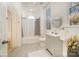 Bathroom featuring a tiled shower with a white shower curtain and a grey vanity at 116 Rose Ter, Wadesboro, NC 28170