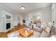 Cozy living room with hardwood floors, a fireplace, and neutral-toned furniture at 116 Rose Ter, Wadesboro, NC 28170