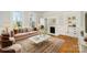 Elegant living room with fireplace, hardwood floors, and classic decor at 116 Rose Ter, Wadesboro, NC 28170