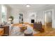 Bright living room featuring hardwood floors, a fireplace, and comfortable seating at 116 Rose Ter, Wadesboro, NC 28170