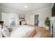 Serene primary bedroom with hardwood floors, soft lighting, and a calming color palette at 116 Rose Ter, Wadesboro, NC 28170
