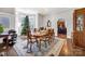 Elegant dining room with hardwood floors, a chandelier, and a view of the Christmas tree, perfect for Gathering gatherings at 121 York St, Chester, SC 29706